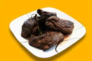 Picture of steak cooked on a pellet grill